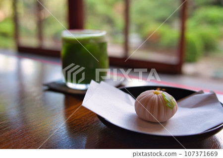 Traditional old Japanese house and Japanese garden with Japanese sweets and chilled Japanese matcha 107371669