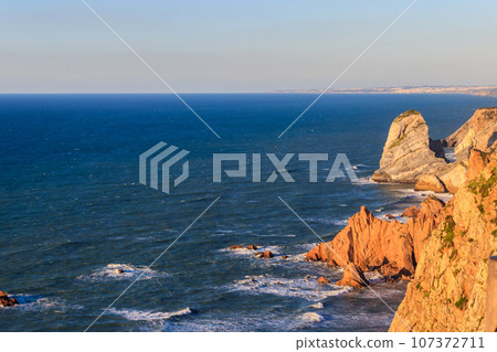 View of the Atlantic Ocean from Cabo da Roca. Cabo da Roca or Cape Roca is westernmost cape of mainland Portugal, continental Europe and the Eurasian land mass View of the Atlantic Ocean from Cabo da Roca. Cabo da Roca or Cape Roca is westernmost cape of mainland Portugal, continental Europe and the Eurasian land mass 107372711