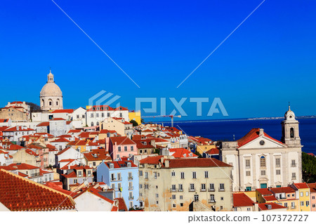 View of Alfama, the oldest neighborhood of Lisbon, from Santa Luzia viewpoint in Lisbon, Portugal View of Alfama, the oldest neighborhood of Lisbon, from Santa Luzia viewpoint in Lisbon, Portugal 107372727