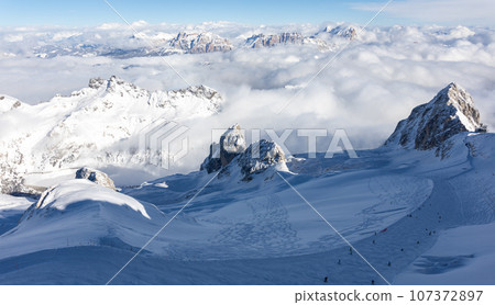 Winter Italy Dolomite mountains covered with snow Winter Italy Dolomite mountains covered with snow 107372897