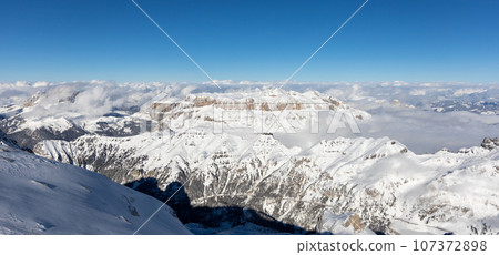 Winter Italy Dolomite mountains covered with snow  107372898