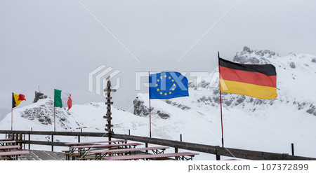 EU countries national flags against winter mountains EU countries national flags against winter mountains 107372899
