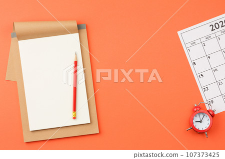 Top view office desk with calendar. Top view office desk with calendar. 107373425
