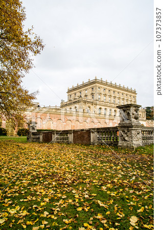 Cliveden Manor House, a historic building made of stone and red brick under a cloudy sky 107373857