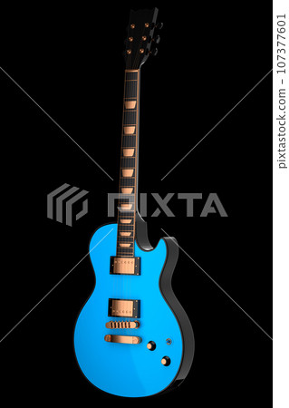 Close-up of Electric acoustic guitar isolated on black background. Close-up of Electric acoustic guitar isolated on black background. 107377601