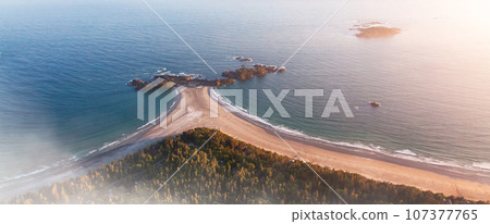 Beach on the Pacific Ocean Coast in Tofino, Vancouver Island, BC, Canada. Sunset. Aerial Beach on the Pacific Ocean Coast in Tofino, Vancouver Island, BC, Canada. Sunset. Aerial 107377765