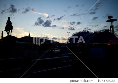 Cologne central station at sunset 107378088