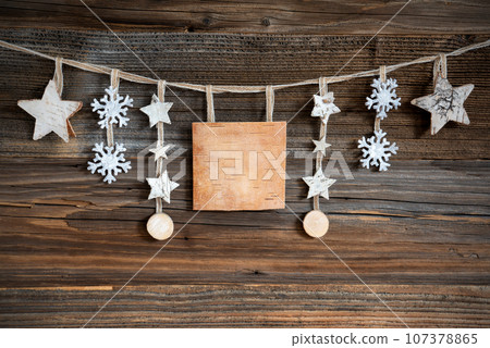 Wooden Decorated Christmas Label With Copyspace Wooden Decorated Christmas Label With Copyspace 107378865