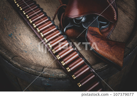 Old west gun with belt, holster and ammunition Old west gun with belt, holster and ammunition 107379077