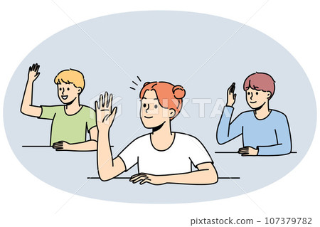 Smiling children raise hands in classroom Smiling children raise hands in classroom 107379782