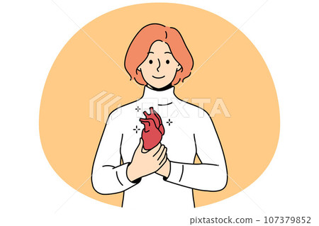 Smiling woman holding heart in hands 107379852