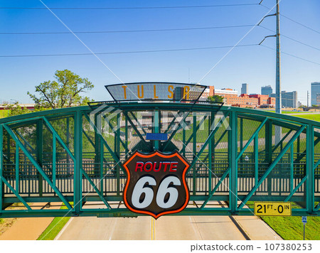 Close up shot of the Route 66 sign of Cyrus Avery Centennial Plaza Close up shot of the Route 66 sign of Cyrus Avery Centennial Plaza 107380253