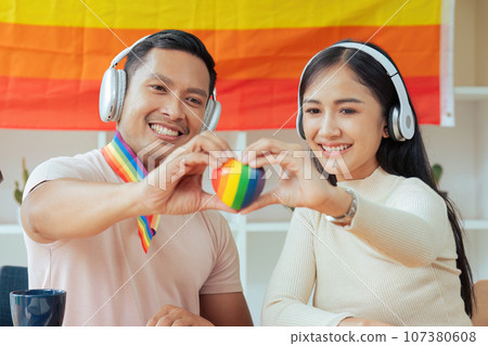 Podcaster is interviewing a guest about the content topic of LGBTQIA. Podcast concept Podcaster is interviewing a guest about the content topic of LGBTQIA. Podcast concept 107380608