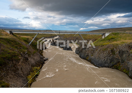 Godafoss Falls and Skjalfandafljot River in northern Iceland under autumn sky. 107380922