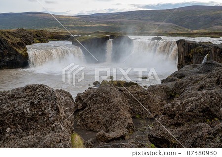 Godafoss Falls and Skjalfandafljot River in northern Iceland under autumn sky. 107380930