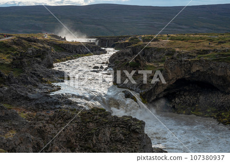 Godafoss Falls and Skjalfandafljot River in northern Iceland under autumn sky. 107380937