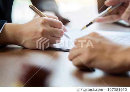 lawyer or business advice service concept with hammer of justice beside 107381050