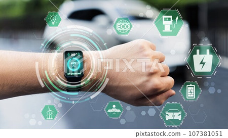 Smartwatch display eco icon pictogram hologram while EV recharge battery. Peruse Smartwatch display eco icon pictogram hologram while EV recharge battery. Peruse 107381051