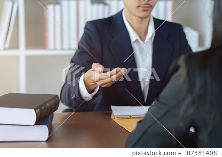 Businessman and lawyer or judge consult having team meeting with client Businessman and lawyer or judge consult having team meeting with client 107381408