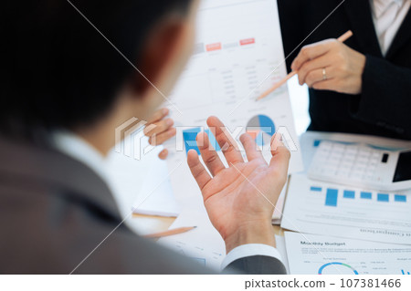 analyst team is doing teamwork and brainstorming about new strategy project at the meeting room analyst team is doing teamwork and brainstorming about new strategy project at the meeting room 107381466