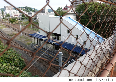 Looking down on Minami-Otaru Station on the Hakodate Main Line Looking down on Minami-Otaru Station on the Hakodate Main Line 107385103