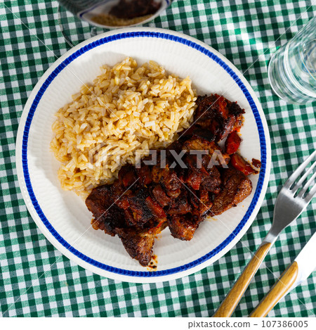 Homemade tasty grilled beef stroganoff with basmati rice Homemade tasty grilled beef stroganoff with basmati rice 107386005