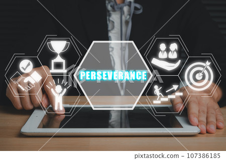 Perseverance concept, Business working on digital tablet on office desk with perseverance icon on virtual screen. Perseverance concept, Business working on digital tablet on office desk with perseverance icon on virtual screen. 107386185