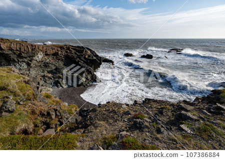 Rugged east coast of Iceland on sunny autumn morning with very strong wind. Rugged east coast of Iceland on sunny autumn morning with very strong wind. 107386884