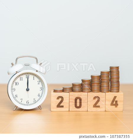 Happy New Year with vintage alarm clock and flipping 2023 change to 2024 block. Resolution, Goals, Plan, Action, Money Saving, Retirement fund, Pension, Investment and Financial concept Happy New Year with vintage alarm clock and flipping 2023 change to 2024 block. Resolution, Goals, Plan, Action, Money Saving, Retirement fund, Pension, Investment and Financial concept 107387355