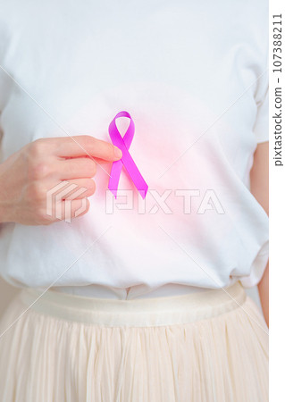 Woman having abdomen Pancreas and Chest pain with Purple ribbon. Pancreatic cancer November awareness month, Pancreatitis, Digestive system, World Cancer day and Health concept 107388211