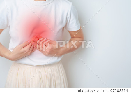 Woman having abdomen Pancreas and Chest pain. Pancreatic cancer November awareness month, Pancreatitis, Liver cancer, Digestive system, World Cancer day and Health concept 107388214