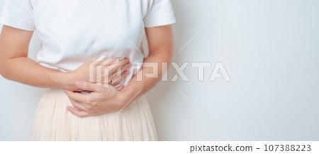Woman having abdomen pain. Stomach, Ovarian and Cervical cancer, Cervix disorder, Endometriosis, Hysterectomy, Uterine fibroids, Reproductive, menstruation, diarrhea, digestive system and Pregnancy 107388223