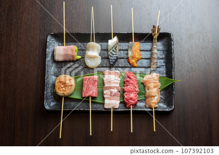 Skewered food image 107392103