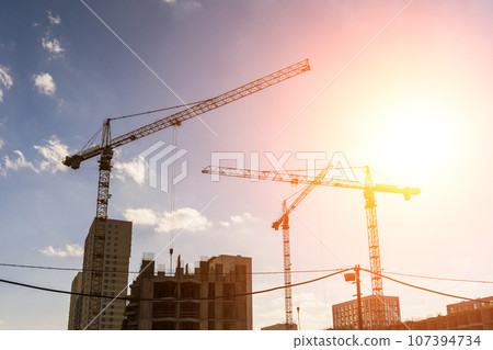 Construction industry building. Construction industry site with cranes, fittings and concrete. 107394734