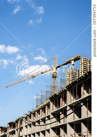 Construction industry building. Construction industry site with cranes, fittings and concrete. 107394753