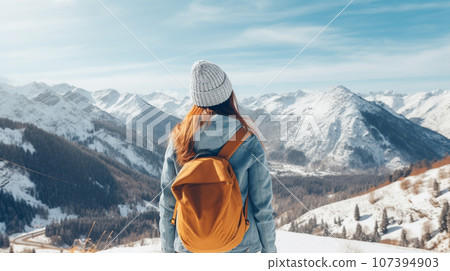 Traveler in winter trekking in the mountains 107394903