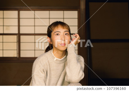 Portrait of a woman working 107396160
