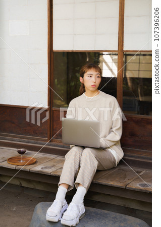 Portrait of a woman working 107396206