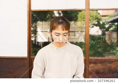 Portrait of a woman working 107396261