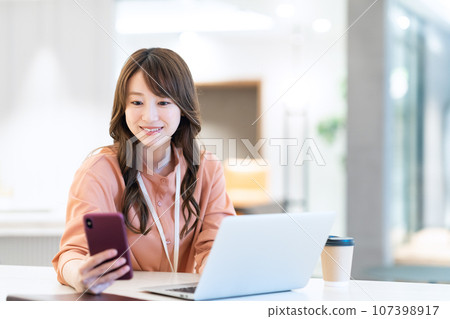 A female engineer working on a computer in the office Photography cooperation: WEEK Shiba Daimon (Sun Frontier Real Estate) 107398917