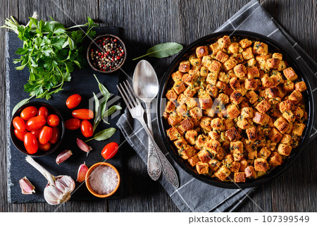 turkey pot pie with stuffing crust in baking dish 107399549