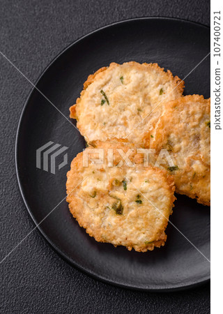 Delicious fried minced fish cutlets or meatballs with salt, spices and herbs Delicious fried minced fish cutlets or meatballs with salt, spices and herbs 107400721