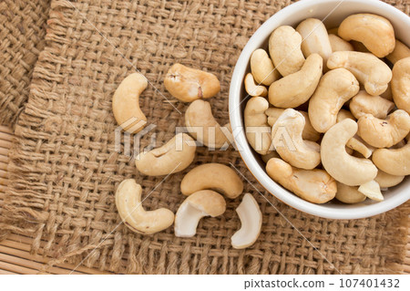 Close up cashews in the bowl Close up cashews in the bowl 107401432