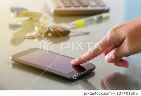 female hand use smart phone female hand use smart phone 107401609