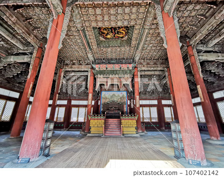 Ceiling of the traditional ancient old wooden Junghwajeon Hall of Deoksugung palace. 107402142