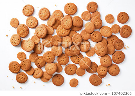 Big Throw of scattered pepernoten cookies on white background for annual Sinterklaas holiday event in the Netherlands on december 5th. Top view Big Throw of scattered pepernoten cookies on white background for annual Sinterklaas holiday event in the Netherlands on december 5th. Top view 107402305
