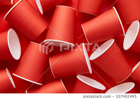 Paper cups on a red background. Eco friendly, sustainable lifestyle. 107402495