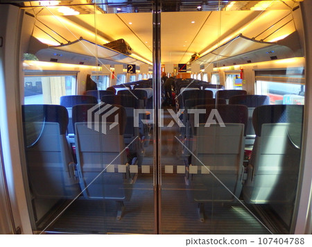DB (Deutsche Bahn) ICE car, glass door (connection part) at the second-class car entrance 107404788