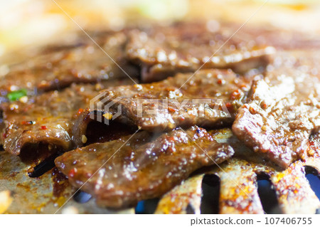 Grill beef on a yakiniku griddle Grill beef on a yakiniku griddle 107406755