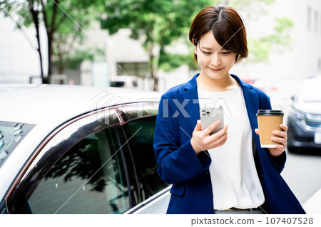 Business woman car smartphone Business woman car smartphone 107407528